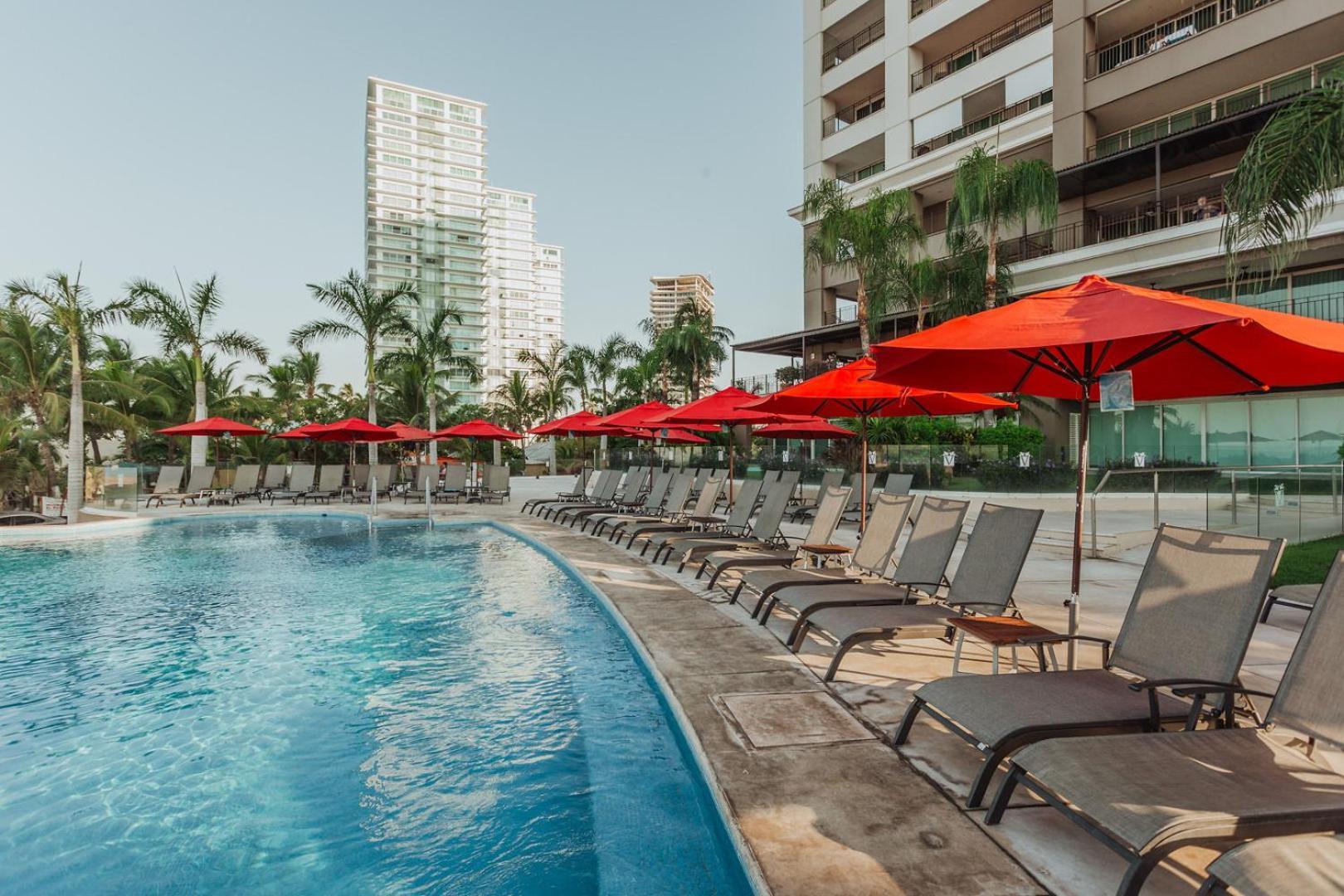 Grand Venetian Beachfront Condos بويرتو فالارتا المظهر الخارجي الصورة