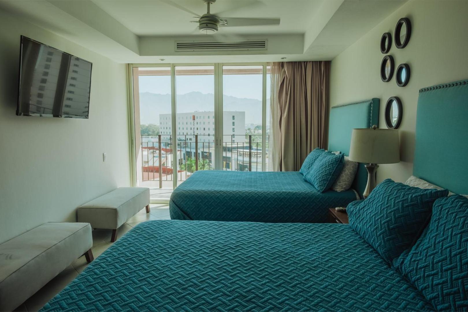 Grand Venetian Beachfront Condos بويرتو فالارتا المظهر الخارجي الصورة